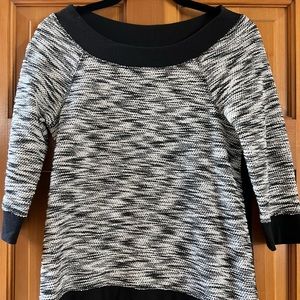 Chico Women’s Top- Black and White 3/4 sleeve with zipper detail on the back